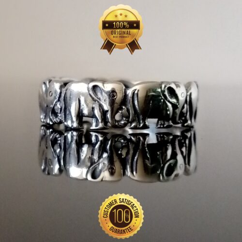 Exquisito anillo de plata fina con detalles intrincados de elefantes, calidad premium de RomeoJewelet.