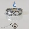 Anillo de diseño artístico con seis elefantes en plata, una pieza de lujo de RomeoJewelet.