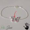 Pulsera Exclusiva Mariposas Multicolor - Plata Pura Joya de plata pura con mariposas de colores y detalles en oro blanco. La pulsera perfecta para añadir un toque de alegría a tu look.