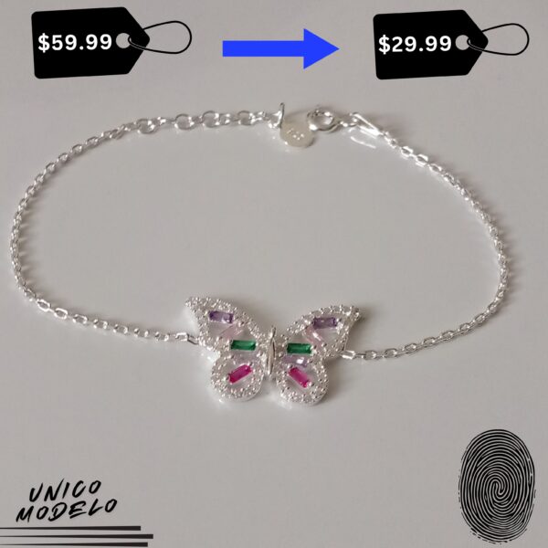Pulsera de Plata Pura con Mariposas de Colores Elegante pulsera de plata pura con mariposas multicolores y detalles en oro blanco. Un regalo perfecto para una mujer especial.