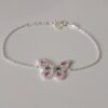 Pulsera Mariposas Multicolor: Elegancia en Plata Pura Pulsera de mariposas en plata pura y oro blanco. Una joya que simboliza la transformación y la libertad.